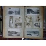 An early 20th century postcard album full of cards mainly Scottish and posted to one family. FOR