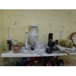 A shelf of onyx ornaments, kitchenware, trays, vases, etc. in green, black and white. [s64] FOR