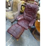 A modern adjustable television chair in red leather with matching footstool FOR DETAILS OF ONLINE