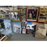 An extensive lot of interesting posters, photographs, prints, etc., including an old framed poster