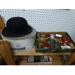 A Christys' London black bowler hat in Henry Heath card box, and a tray of assorted vintage dolls