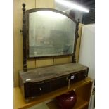 A charming 19th century mahogany dressing table mirror with a domed topped rectangular plate edged