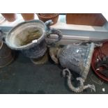 A pair of urn shaped lead planters with moulded decoration and serpent handles [hall] FOR DETAILS OF
