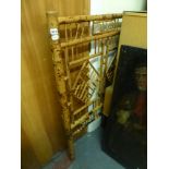 A double bedhead in fancy bamboo work (58 in approx.) FOR DETAILS OF ONLINE BIDDING ON THIS LOT