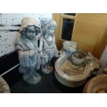 A stoneware water fountain and two stoneware figurines of children [hall] FOR DETAILS OF ONLINE