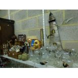 A large quantity of drinking glasses, two Venetian style wall masks, a wooden cat ornament and