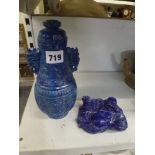 Two Chinese lapis lazuli carvings, one as a baluster vase with cover in archaic style, 22 cm high,