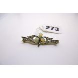 A pretty late Victorian diamond and opal brooch in silver backed with gold, central trefoil motif,
