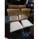 A set of four modern beech slat-back chairs FOR DETAILS OF ONLINE BIDDING ON THIS LOT CONTACT