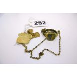 A pair of 9 ct gold cufflinks, estimated weight 6.1 gm, and a yellow metal ring and chain FOR