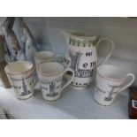 A Wedgwood 'Oranges and Lemons' set of jug and four mugs, designed by Richard Guyatt, originally for