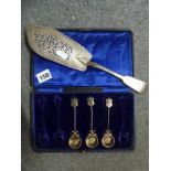A silver Fiddle pattern fish slice, with beaver crest, London 1837, together with three (of a set of