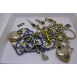 A selection of silver jewellery, including a Gucci influenced chain, two sapphire and pearl