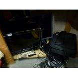 An Evotel Monitor and a small LG Television, a Laptop and a Compaq Armada Laptop in bag. [G1] FOR