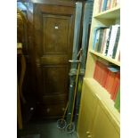 A pair of vintage wooden skis and bamboo poles by Dethleffs with leather straps. [next to lot 880]