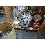 Five assorted pottery table lamps and two shades [bottom of pine shelves next to s21] FOR DETAILS OF