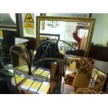A circular 1930s mirror with etched decoration, a folding bevel glass dressing table mirror plus two