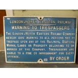 An antique London & North Eastern railway trespass sign in cast iron, numbered 07, 17 x 26 in [under