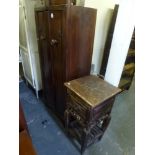 A small polished wood storage cupboard with two doors, a rustic small side cabinet with a drawer and