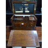 An Edwardian oak travelling correspondence box and contents [room] FOR DETAILS OF ONLINE BIDDING