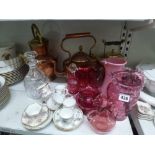 A small collection of cranberry glass including vases, dishes and wine glasses, 19th century