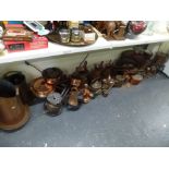 A large collection of mainly copper wares 19th century and later including watering cans, kettles,