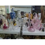 A lovely collection of perfume bottles including two large Art Deco style in pink with stoppers, a