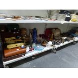 A mixed lot of two shelves including wooden boxes, a Schweppes Soda syphon, a wooden lighthouse