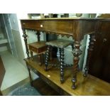 A Victorian hall table with a decorative frieze on fancy spiral turned tapering legs with a