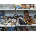 A mixed lot including a cast iron recumbent lion doorstop, a quantity of wooden and other a owls,