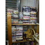 A large quantity of DVDs including Peep Show and Casino Royale and a quantity of CDs mainly