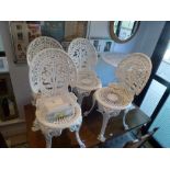 A white painted aluminium garden set comprising a circular table and four chairs. FOR DETAILS OF