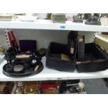 A black leather Gladstone vanity case with fitted lift-out central portion, together with a large