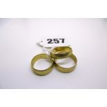 Three 9 ct gold wedding rings, estimated weight 9 gm FOR DETAILS OF ONLINE BIDDING ON THIS LOT