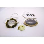 Two antique yellow metal hair-work brooches and a small yellow metal chain FOR DETAILS OF ONLINE