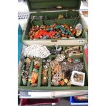 A wooden box and tray of costume jewellery including some interesting brooches and three Japanese