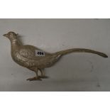 A cast metal pheasant table ornament, tests as variable grade silver, 29.7 ozt TO BID ON THIS LOT