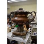 A large Regency urn in copper and brass, with cover [D] TO BID ON THIS LOT AND FOR VIEWING