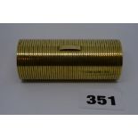 A Kutchinsky 9 ct gold cylindrical box with ribbed finish, London 1960, 65.9 gm TO BID ON THIS LOT