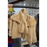 A lady's blonde mink fur cropped jacket with three-quarter length sleeves and wide shawl collar,