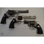 Three Japanese Kokusai replica revolvers in grey finish, comprising: Smith & Wesson 44 magnum,