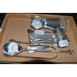 Cutlery, comprising: a plain George IV silver sugar tongs, a set of eight foreign 925 teaspoons with