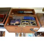 A late Victorian magneto-electric machine, in wooden box, with various accessories in base drawer [