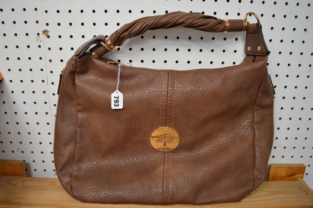 A large donkey brown leather Mulberry handbag with twist handle [upstairs shelves} TO BID ON THIS