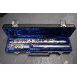 A cased flute [floor next to s83] TO BID ON THIS LOT AND FOR VIEWING APPOINTMENTS CONTACT