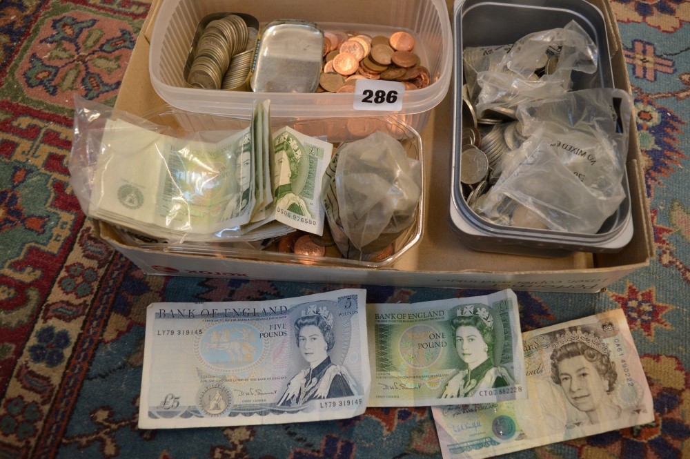 A quantity of copper and silver including a small tin full of Victorian and pre-'47 silver, 12