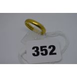 A 22 ct gold band ring, 7.6 gm TO BID ON THIS LOT AND FOR VIEWING APPOINTMENTS CONTACT