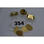 9 ct gold, comprising: a band ring, signet ring, signet ring with tiger's eye, and a pair of