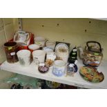A collection of commemorative items including Spode and Paragon mugs, beakers and dishes, glass