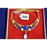 A glamorous gilt-metal necklace set with blue and white stones, stamped 'Christian Dior' TO BID ON
